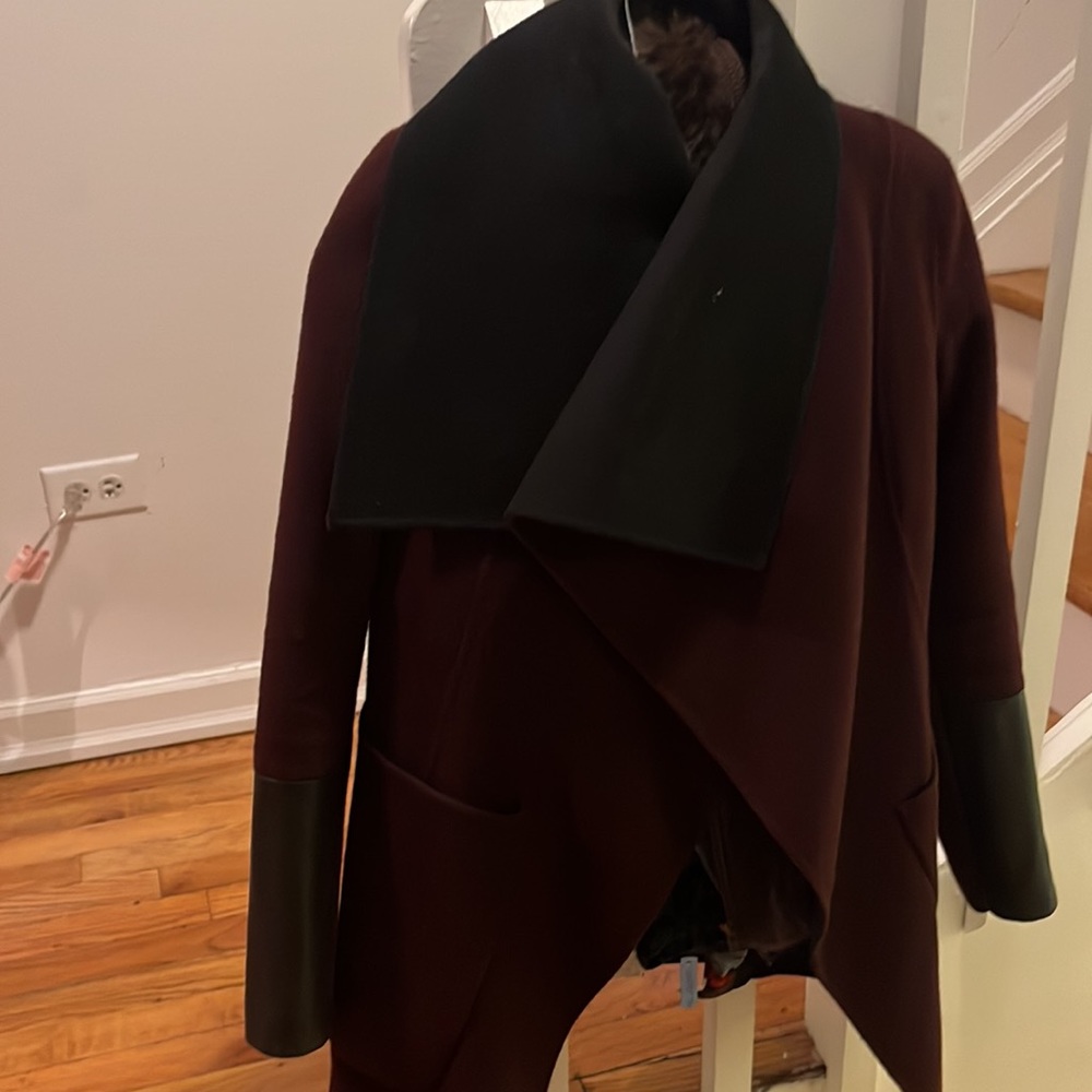 Bcbg wool coat with accent faux leather.